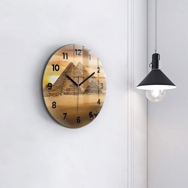 Horloge ronde Pyramides et coucher de soleil
