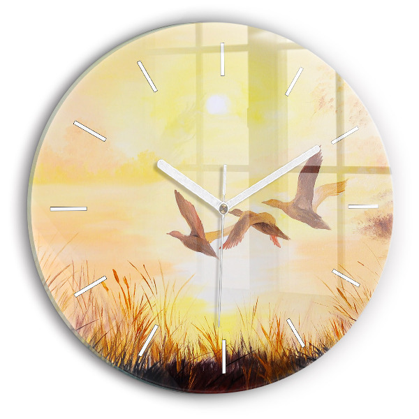 Pendule murale ronde Grues au coucher du soleil