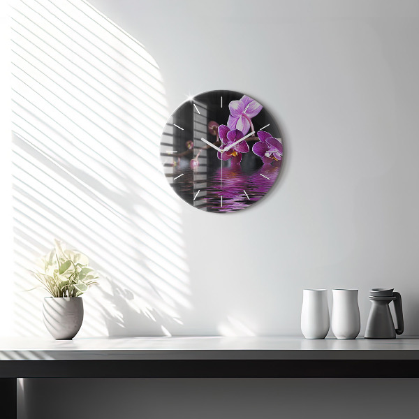 Horloge ronde 'Fleur d''orchidée sur l''eau'