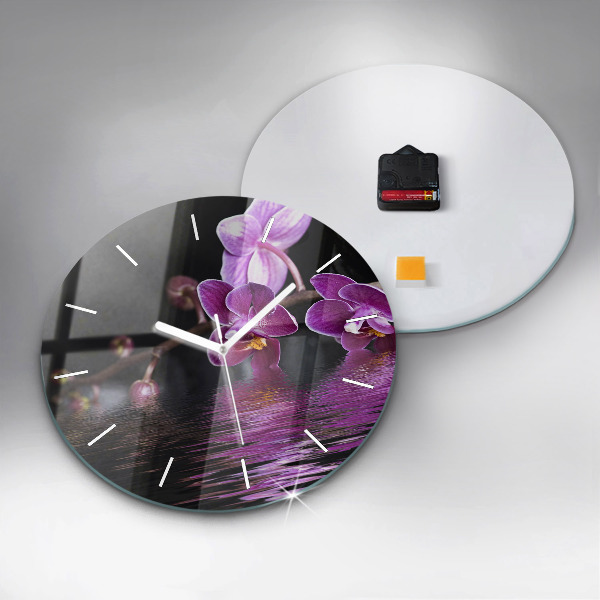 Horloge ronde 'Fleur d''orchidée sur l''eau'