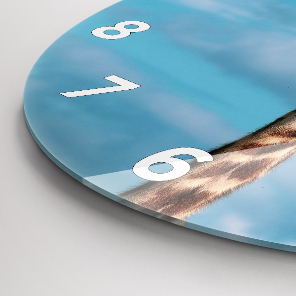 Horloge ronde Tête de girafe contre le ciel