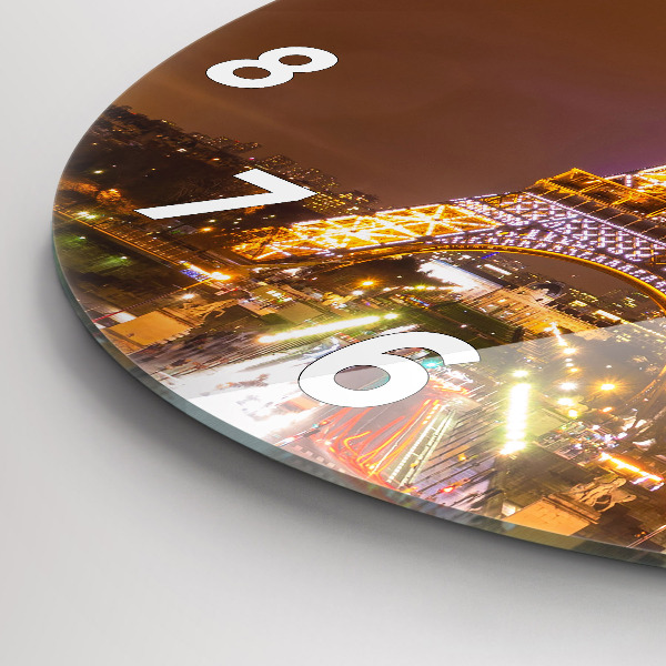 Horloge ronde Tour Eiffel illuminée