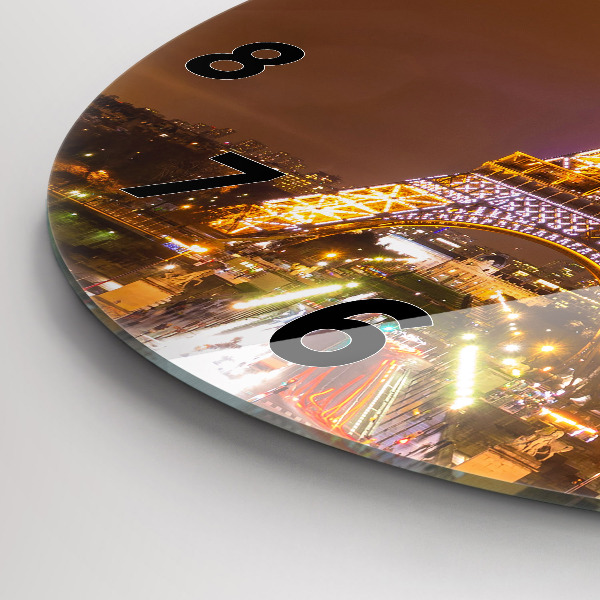 Horloge ronde Tour Eiffel illuminée