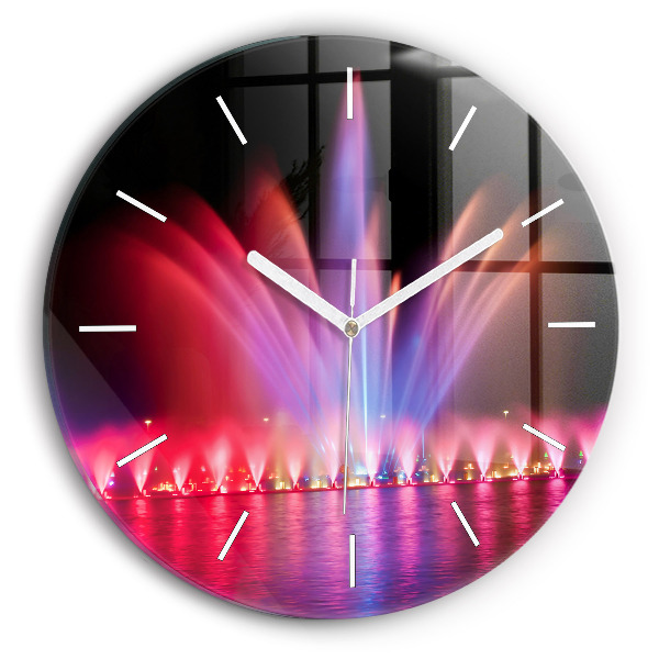 Horloge ronde Fontaine de Wroclaw la nuit