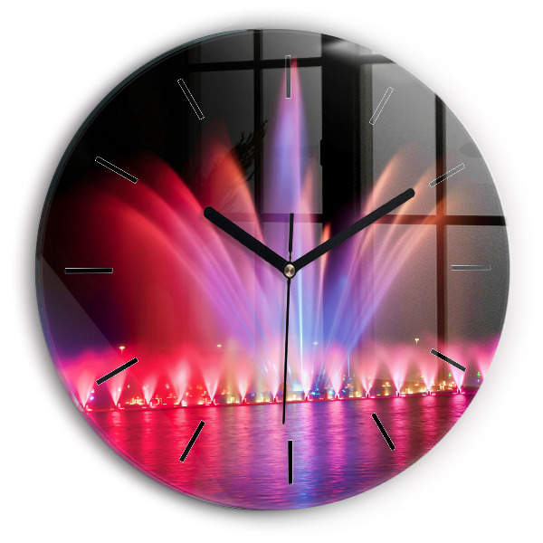 Horloge ronde Fontaine de Wroclaw la nuit