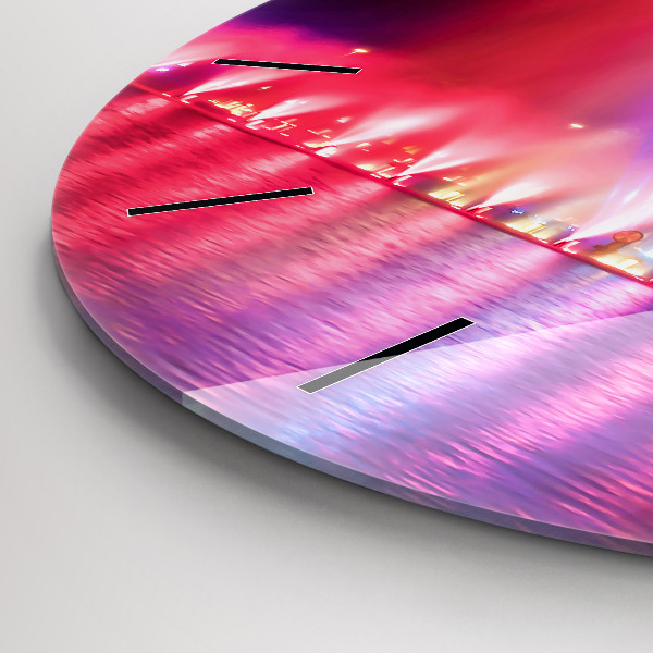 Horloge ronde Fontaine de Wroclaw la nuit