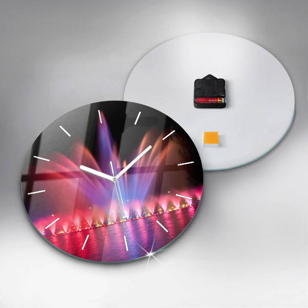 Horloge ronde Fontaine de Wroclaw la nuit