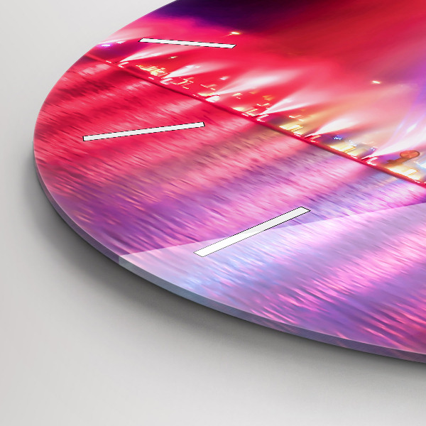 Horloge ronde Fontaine de Wroclaw la nuit