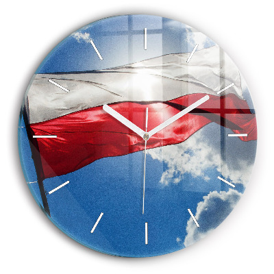 Horloge ronde Le drapeau polonais contre le ciel