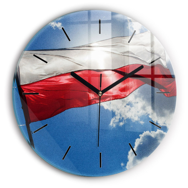 Horloge ronde Le drapeau polonais contre le ciel