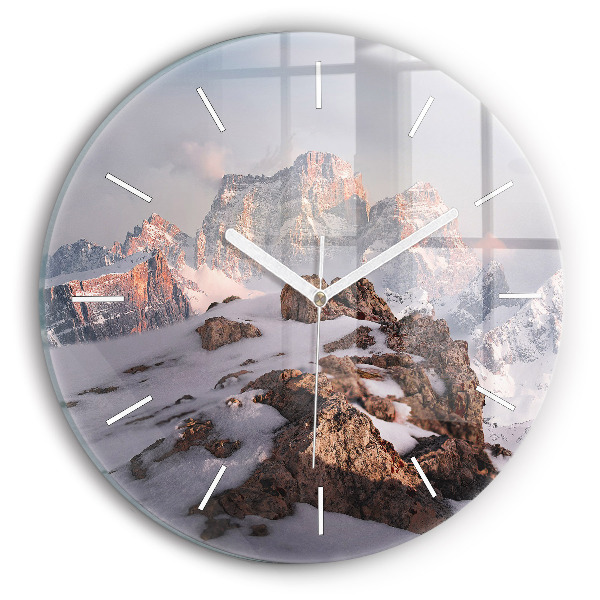 Horloge ronde Une montagne couverte de neige