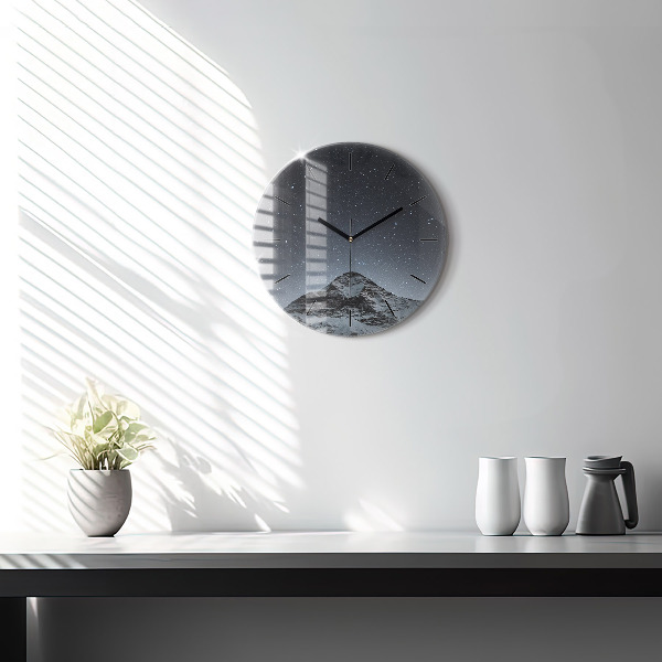 Horloge ronde Montagne sous les étoiles