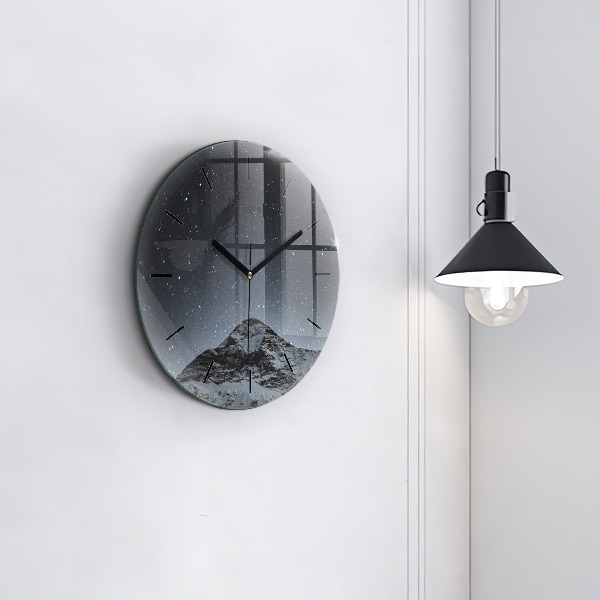 Horloge ronde Montagne sous les étoiles