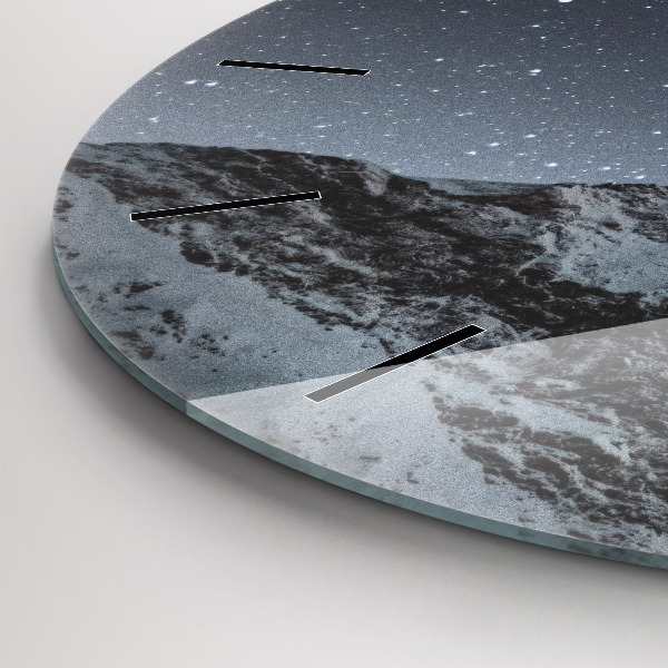 Horloge ronde Montagne sous les étoiles