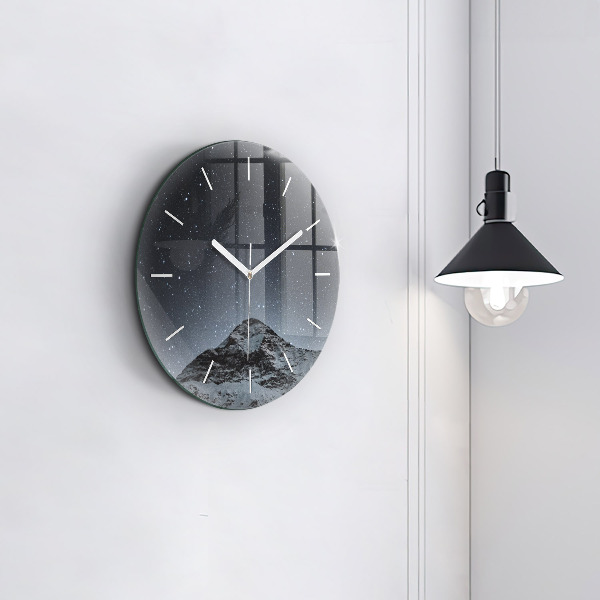 Horloge ronde Montagne sous les étoiles