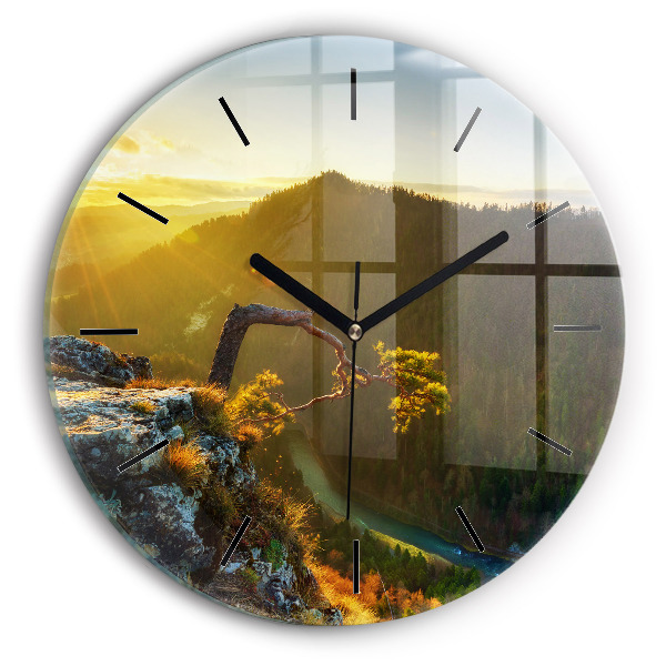 Pendule murale ronde Coucher de soleil sur les montagnes
