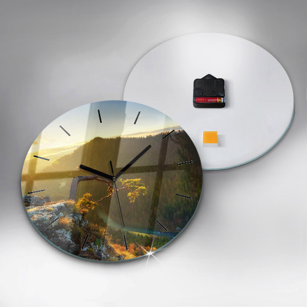 Pendule murale ronde Coucher de soleil sur les montagnes