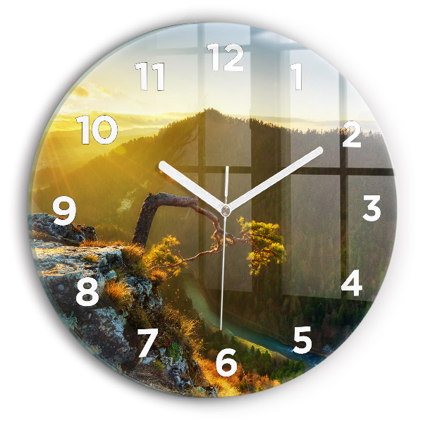 Pendule murale ronde Coucher de soleil sur les montagnes