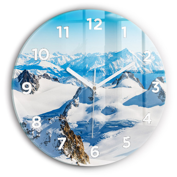 Horloge ronde Skieur dans les Alpes