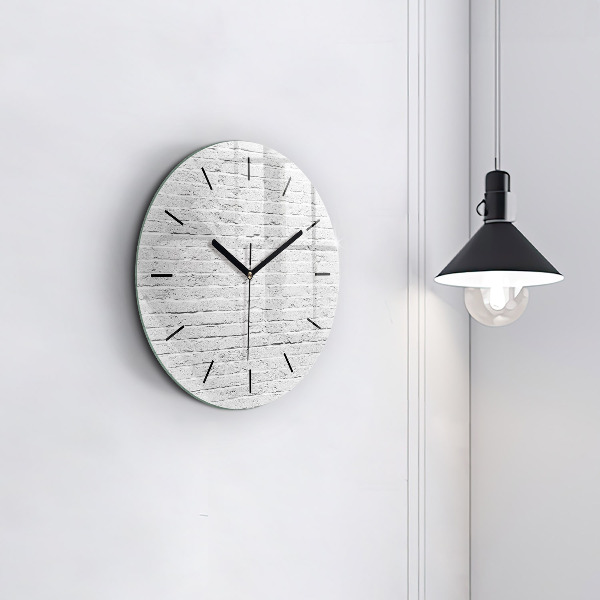 Horloge ronde Un mur de briques claires