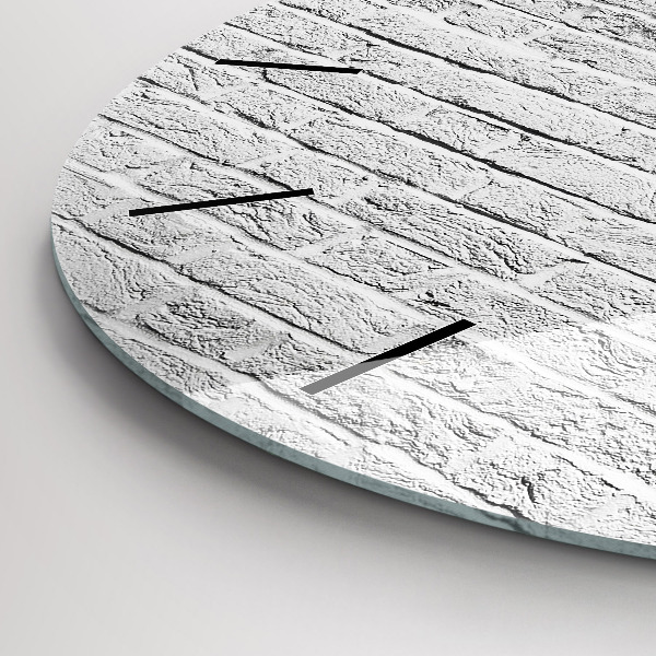 Horloge ronde Un mur de briques claires