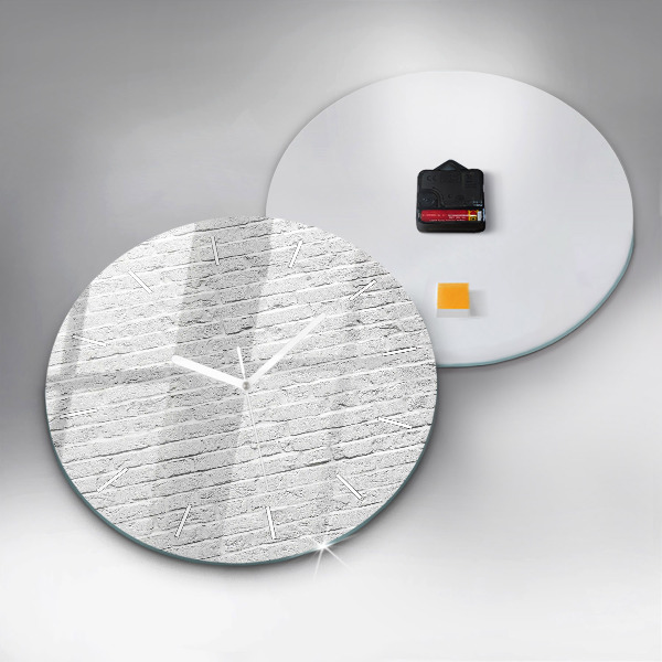 Horloge ronde Un mur de briques claires