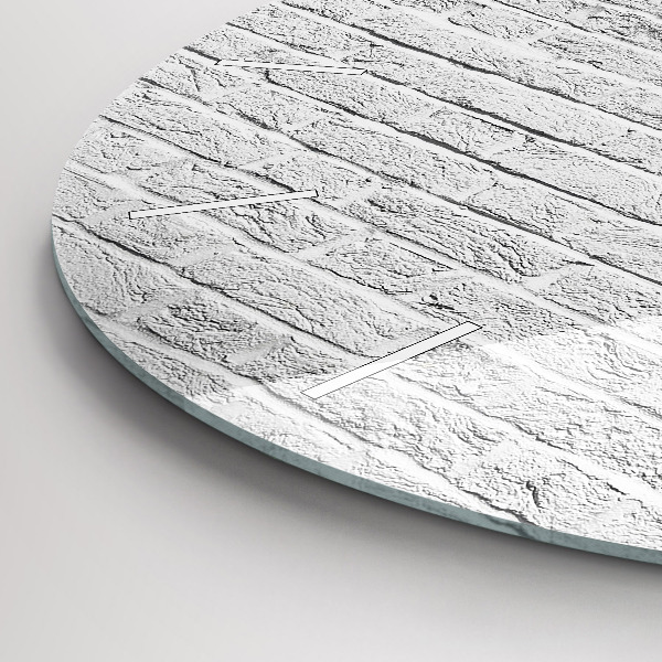 Horloge ronde Un mur de briques claires