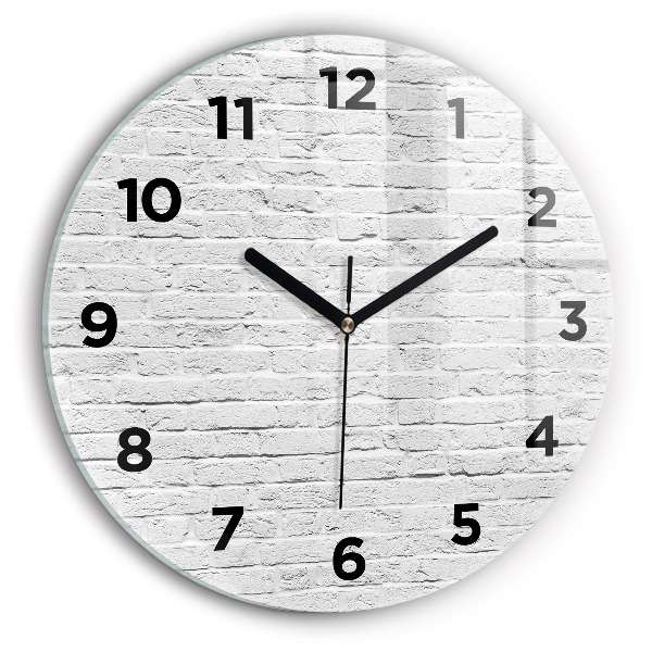 Horloge ronde Un mur de briques claires