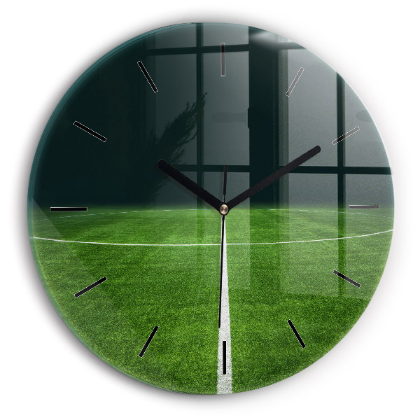 Horloge ronde terrain de football