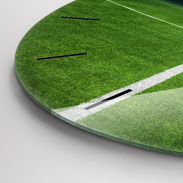 Horloge ronde terrain de football