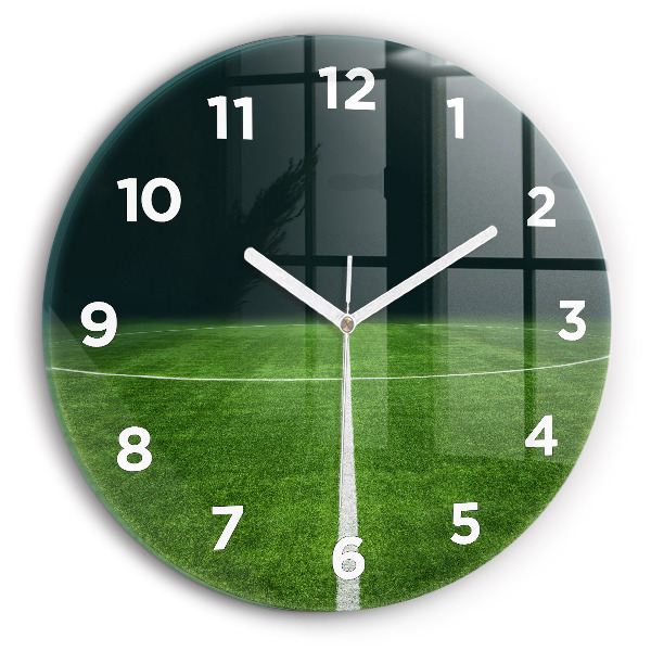 Horloge ronde terrain de football
