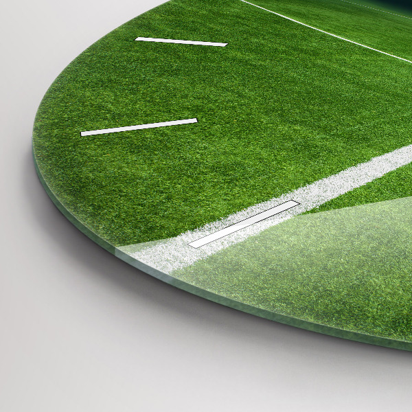 Horloge ronde terrain de football