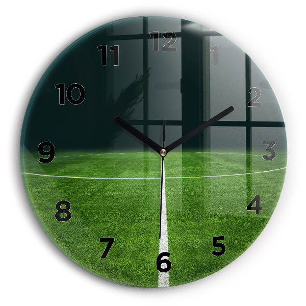 Horloge ronde terrain de football