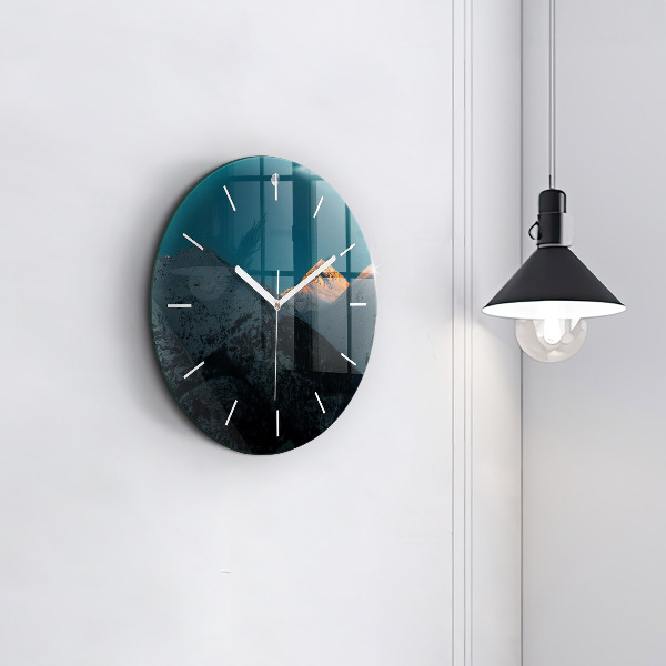 Horloge ronde Coucher de soleil dans les montagnes