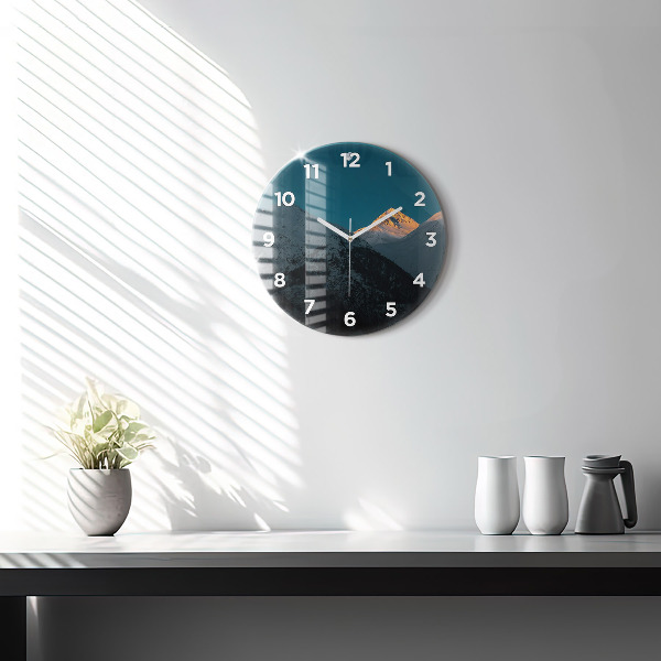 Horloge ronde Coucher de soleil dans les montagnes
