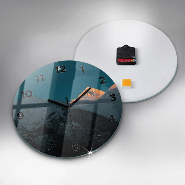 Horloge ronde Coucher de soleil dans les montagnes